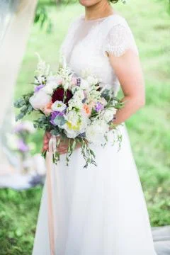 Wedding bouquet in bride's hands 写真素材