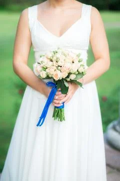 Wedding bouquet in bride's hands Stock Photos