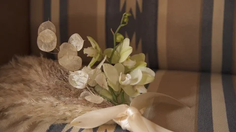 Wedding bouquet in the couch Stock Footage 119398783
