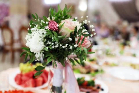 Wedding bouquet on the festive table Stock Photos