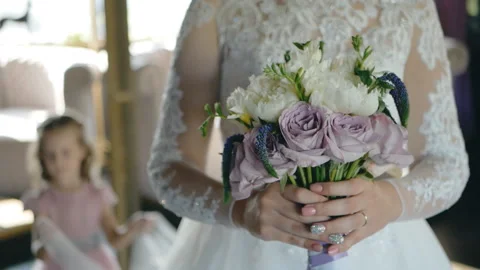 Wedding bouquet in the hands of the bride at the ceremony Stock Footage 120631367
