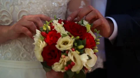 Wedding bouquet in hands of the bride Stock Footage 51573859