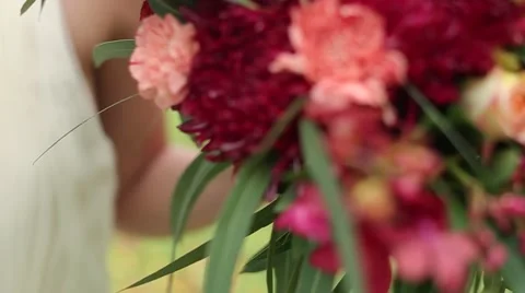 Wedding bouquet in hands of the bride Stock Footage 57684677