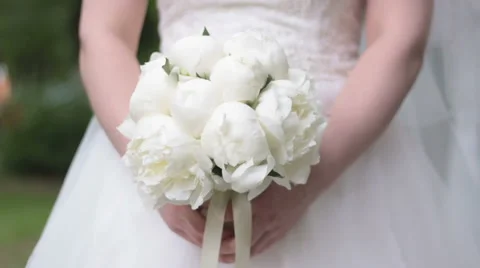Wedding Bouquet in Hands of Bride Stock Footage 66233749