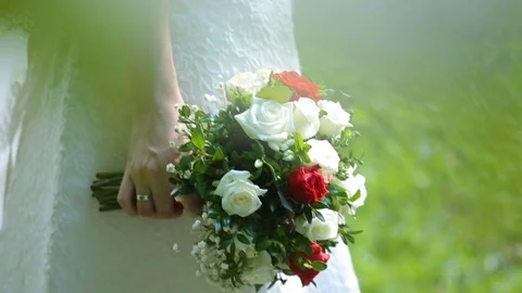 Wedding bouquet in hands of the bride Stock Footage 71922957