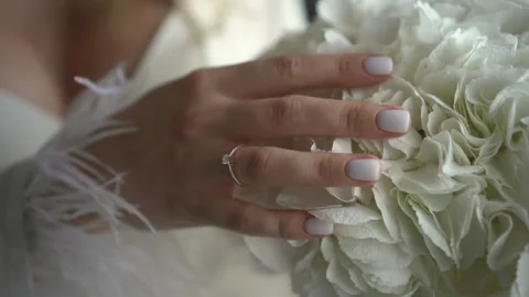 Wedding bouquet in the hands of the bride Stock Footage 167453419