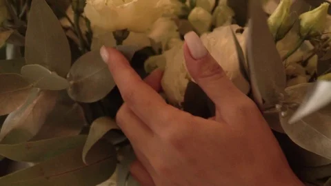 Wedding bouquet in the hands of the bride in a white dress Stock Footage 123002002