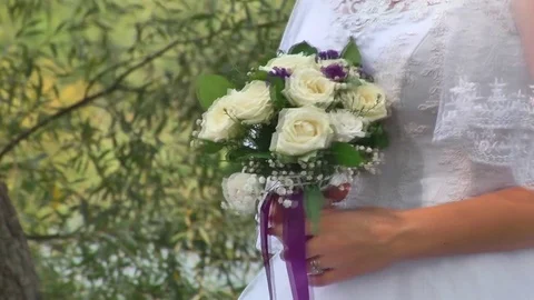 Wedding bouquet in hands Stock Footage 80472955