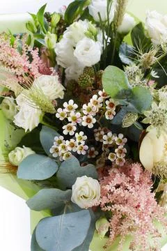 A wedding bouquet isolated on white. Fresh, lush bouquet of colorful flowers. Stock Photos