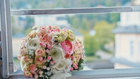 Wedding bouquet lies on the window Stock Footage 75167604