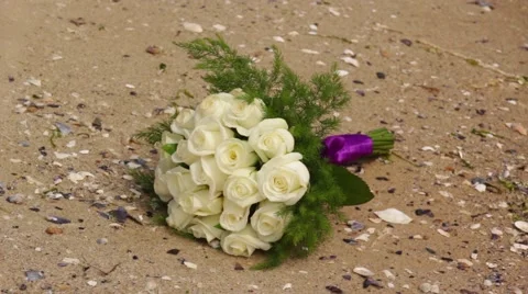 Wedding bouquet on the sand Stock Footage 40619014