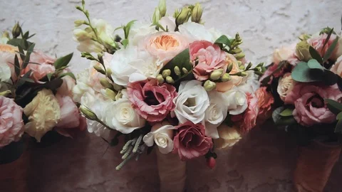 Wedding bouquets of the bride and boy on the texture background Видео 106095403