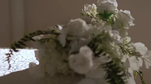 Wedding Bouquets on a Dining Table Stock Footage 241323280