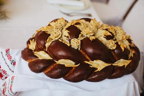 Wedding bread from wheat flour dough on the plate Stock Photos