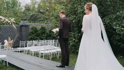 Wedding the bride goes to her first meeting with the groom	 Video stock 272310163