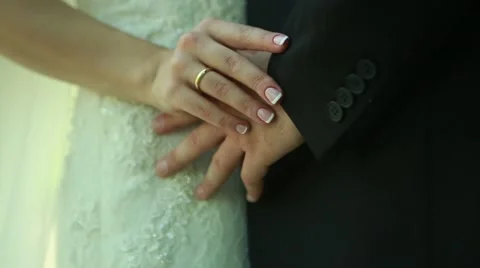 Wedding, bride groom stroking the arm Stock Footage 56550700