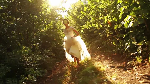 Wedding Bride Running in Forest Slow Motion HD Stock Footage 29465185