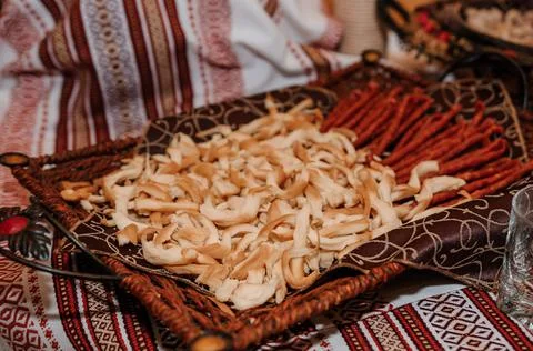 Wedding buffet. Slicing different types of cheese. Catering Stock Photos