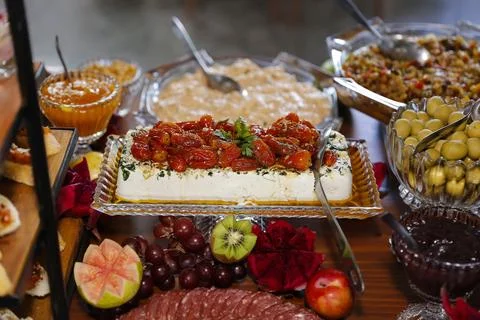 Wedding Buffet Table with White Cheese Cherry Tomatoes Confit Tropical Frui.. Stock Photos