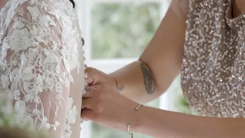 Wedding buttoning up Dress, Tying High Heels engagement ring Stock Footage 224299052