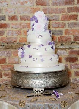 Wedding cake and knife Stock Photos