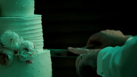 Wedding cake being sliced with two hands and flash photography Stock Footage 109655002