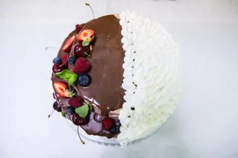 Wedding cake with berries Stock Photos