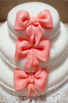 Wedding cake with bows Stock Photos
