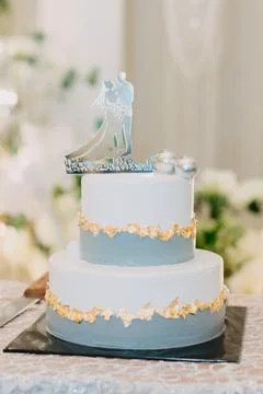 Wedding Cake with Mirror Silhouette Topper. Stock Photos