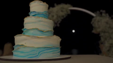 Wedding cake with romantic moon lighting behind Stock Footage 149896423