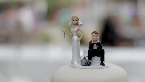 Wedding Cake Topper of a bride and groom Stock Footage 142011509