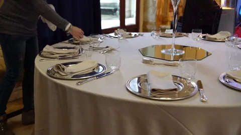 Wedding catering preparation, a waiter preparing a beautiful table set.. 스톡 동영상 74633346