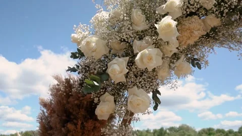 Wedding ceremony on the beach at sun day with a beautiful crystal wedding arch Stock Footage 252196478