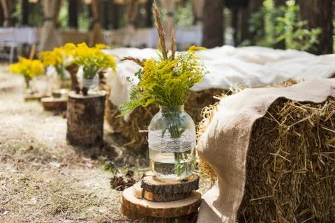 Wedding ceremony decorations. Rustic style of elements of decor Stock Photos