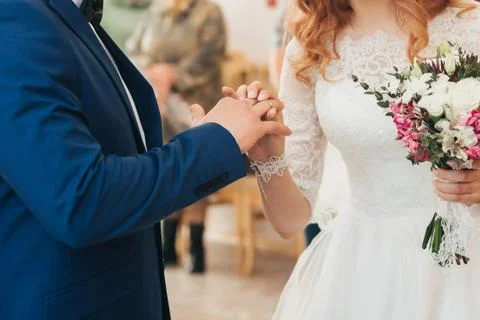Wedding ceremony of exchange of rings between the bride and groom Stock Photos