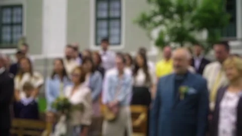 The wedding ceremony. The guests are watching the newlyweds. wedding guests.  Stock Footage 279718525