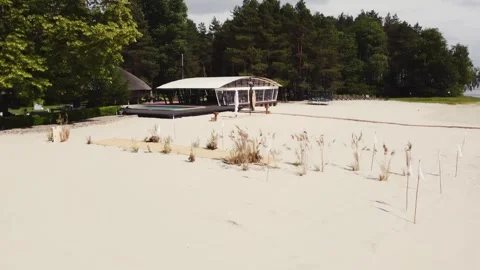 Wedding ceremony on a sandy beach, wedding decor. No people. Drone makes a Stock Footage 321944208