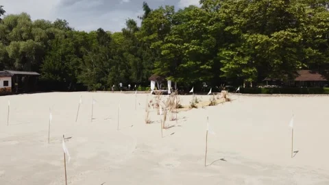 Wedding ceremony on a sandy beach with white sand, wedding decor. Ceremony Stock Footage 321944199