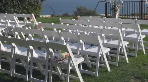 Wedding chairs in front of ocean Stock Footage 12109019
