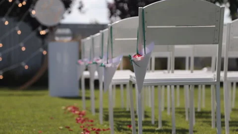 Wedding chairs in the meadow Stock Footage 142382733