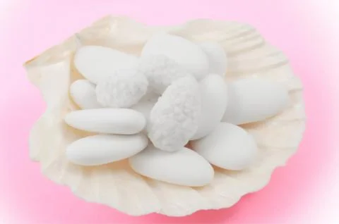 Wedding comfit in a shell Stock Photos