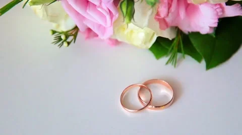Wedding composition with a bouquet and wedding rings Stock Footage 56480198