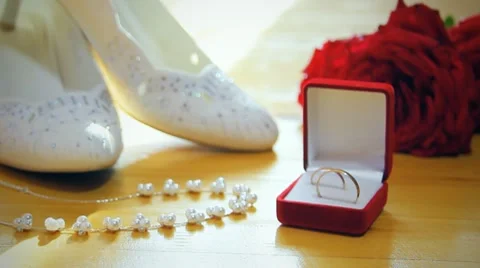 Wedding composition, rings, bride shoes Stock Footage