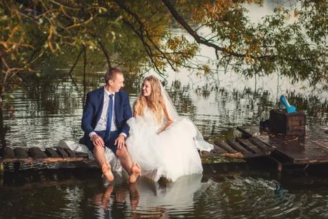Wedding couple and lake Stock Photos