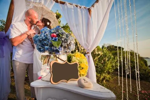Wedding couple at the beach with frame Stock Photos