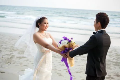 Wedding couple at beach Stock Photos