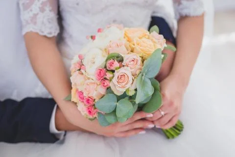 Wedding couple with bouquet Stock Photos