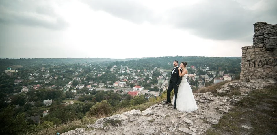 Wedding couple posing for the camera Stock Photos