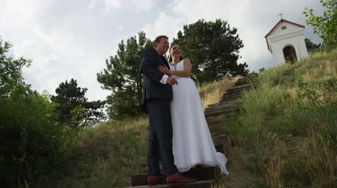 Wedding Couple Posing Stairs Pointing - 4k - Slow Motion Stock Footage 52531982