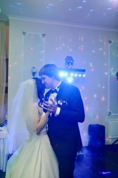 Wedding couple in the restaurant is dancing Stock Photos